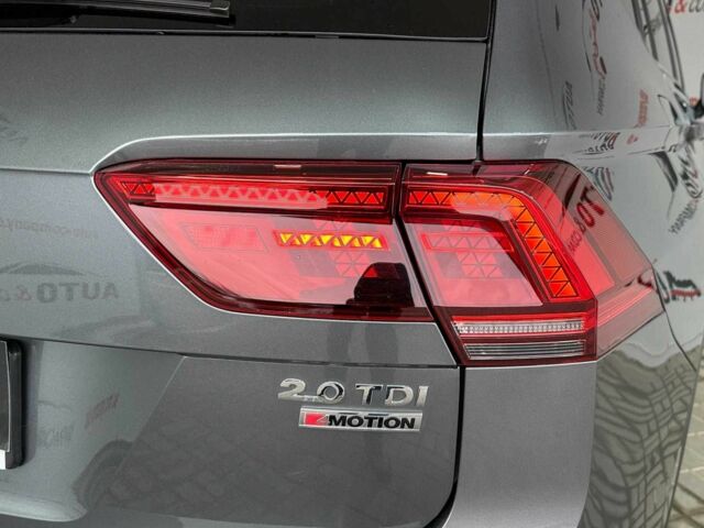 Серый Фольксваген Тигуан, объемом двигателя 2 л и пробегом 155 тыс. км за 28450 $, фото 22 на Automoto.ua