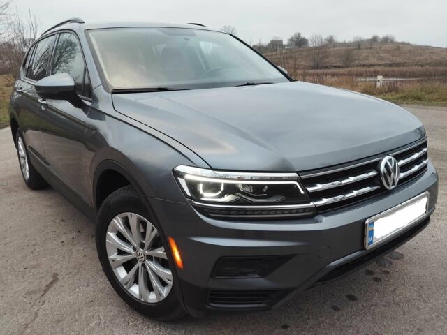 Серый Фольксваген Тигуан, объемом двигателя 2 л и пробегом 160 тыс. км за 16000 $, фото 2 на Automoto.ua