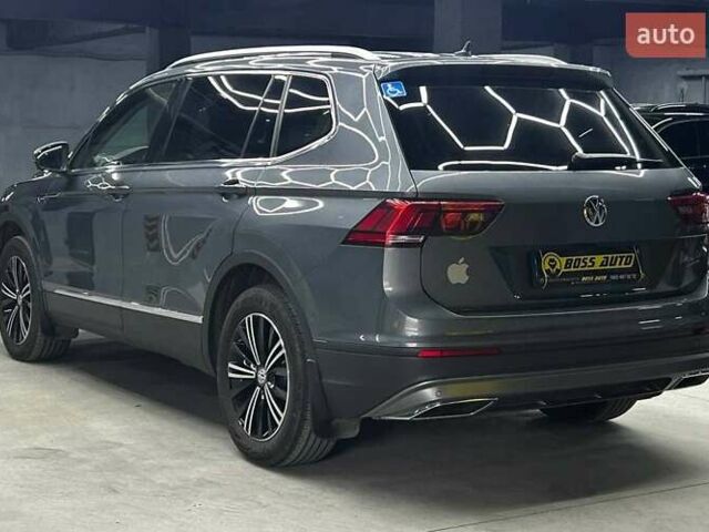 Серый Фольксваген Тигуан, объемом двигателя 1.97 л и пробегом 275 тыс. км за 26400 $, фото 3 на Automoto.ua