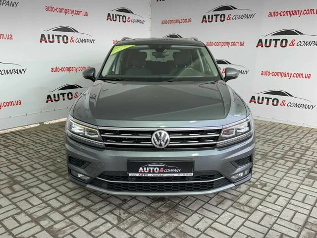 Серый Фольксваген Тигуан, объемом двигателя 2 л и пробегом 155 тыс. км за 28450 $, фото 1 на Automoto.ua