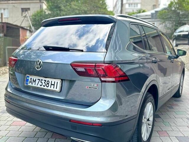 Серый Фольксваген Тигуан, объемом двигателя 2 л и пробегом 103 тыс. км за 331 $, фото 2 на Automoto.ua