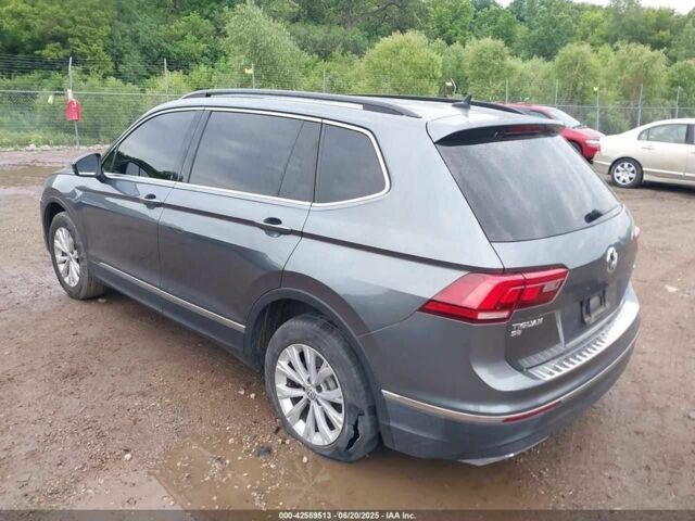 Серый Фольксваген Тигуан, объемом двигателя 2 л и пробегом 58 тыс. км за 18500 $, фото 2 на Automoto.ua