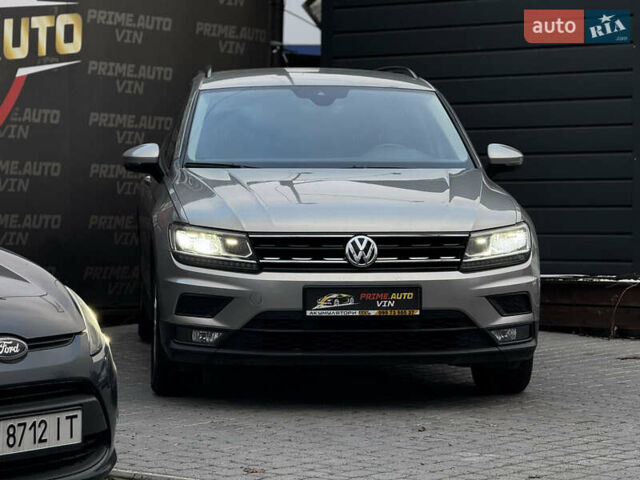 Серый Фольксваген Тигуан, объемом двигателя 2 л и пробегом 248 тыс. км за 21500 $, фото 2 на Automoto.ua