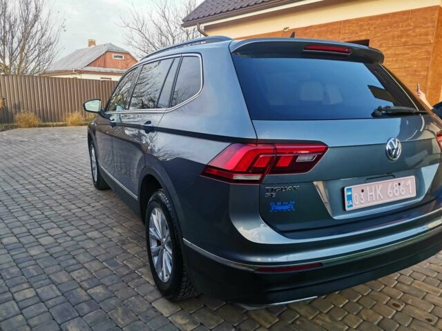 Серый Фольксваген Тигуан, объемом двигателя 2 л и пробегом 165 тыс. км за 16700 $, фото 5 на Automoto.ua