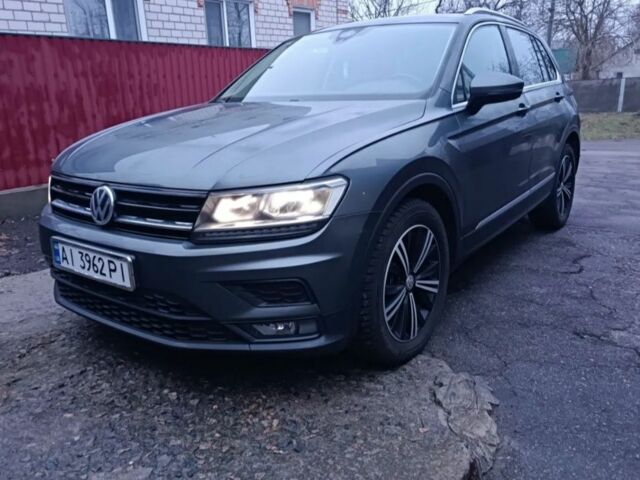 Серый Фольксваген Тигуан, объемом двигателя 2 л и пробегом 210 тыс. км за 21500 $, фото 1 на Automoto.ua