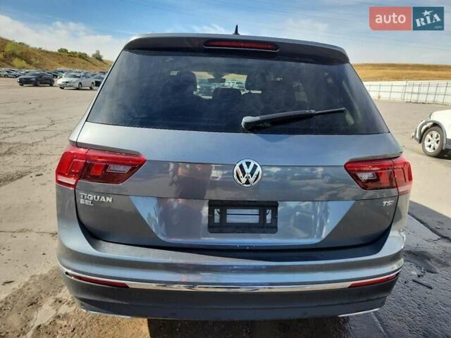 Серый Фольксваген Тигуан, объемом двигателя 2 л и пробегом 65 тыс. км за 22000 $, фото 4 на Automoto.ua