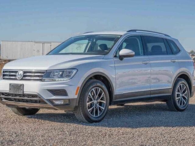 Серый Фольксваген Тигуан, объемом двигателя 2 л и пробегом 87 тыс. км за 10900 $, фото 1 на Automoto.ua