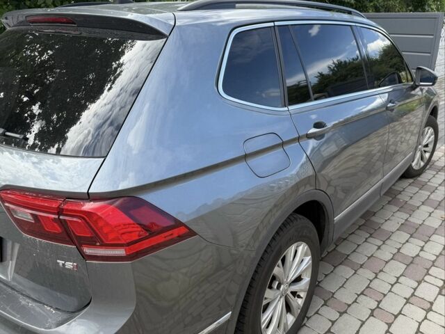 Серый Фольксваген Тигуан, объемом двигателя 2 л и пробегом 234 тыс. км за 15450 $, фото 5 на Automoto.ua