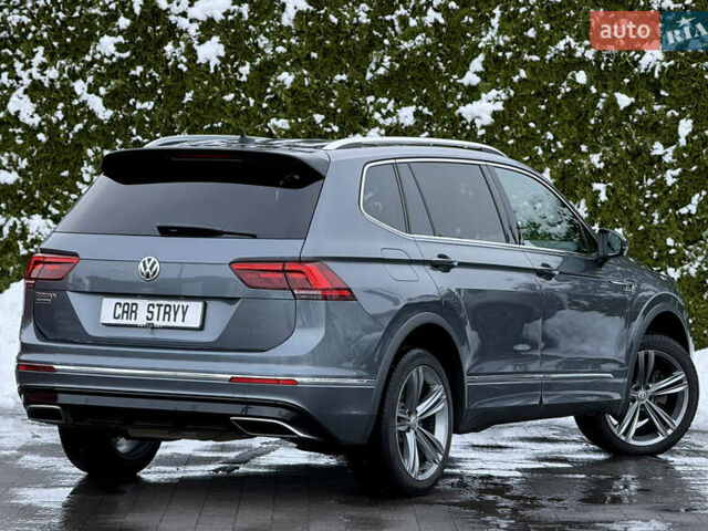 Серый Фольксваген Тигуан, объемом двигателя 2 л и пробегом 241 тыс. км за 26999 $, фото 3 на Automoto.ua