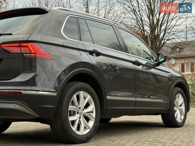 Серый Фольксваген Тигуан, объемом двигателя 2 л и пробегом 143 тыс. км за 29500 $, фото 14 на Automoto.ua