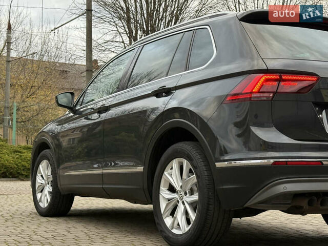 Серый Фольксваген Тигуан, объемом двигателя 2 л и пробегом 143 тыс. км за 29500 $, фото 13 на Automoto.ua