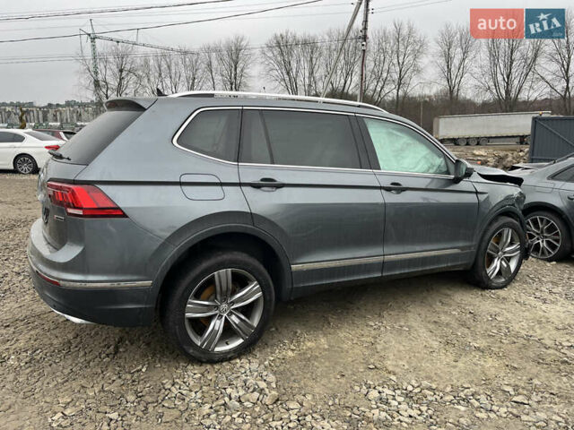Сірий Фольксваген Тігуан, об'ємом двигуна 2 л та пробігом 176 тис. км за 13500 $, фото 3 на Automoto.ua
