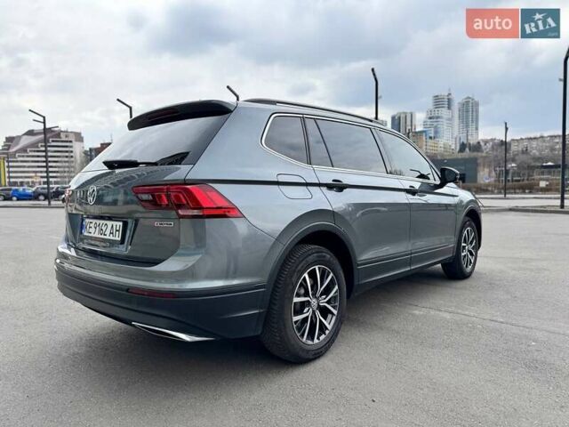 Сірий Фольксваген Тігуан, об'ємом двигуна 1.98 л та пробігом 112 тис. км за 22000 $, фото 1 на Automoto.ua