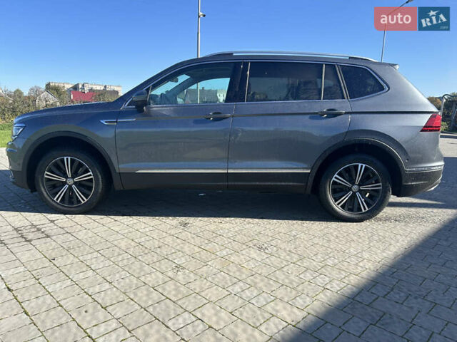 Серый Фольксваген Тигуан, объемом двигателя 2 л и пробегом 212 тыс. км за 26500 $, фото 1 на Automoto.ua