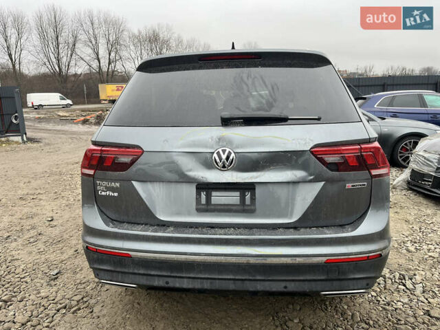 Сірий Фольксваген Тігуан, об'ємом двигуна 2 л та пробігом 176 тис. км за 13500 $, фото 2 на Automoto.ua