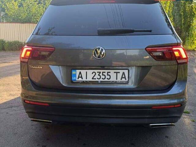 Сірий Фольксваген Тігуан, об'ємом двигуна 1.98 л та пробігом 52 тис. км за 19500 $, фото 1 на Automoto.ua