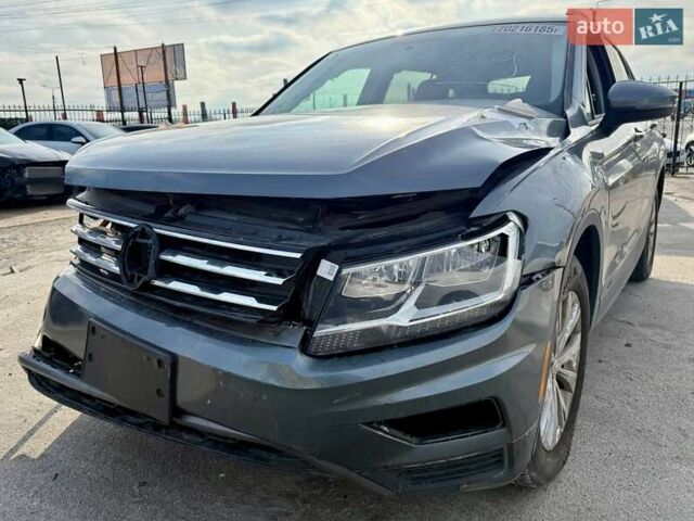 Серый Фольксваген Тигуан, объемом двигателя 2 л и пробегом 91 тыс. км за 11300 $, фото 2 на Automoto.ua