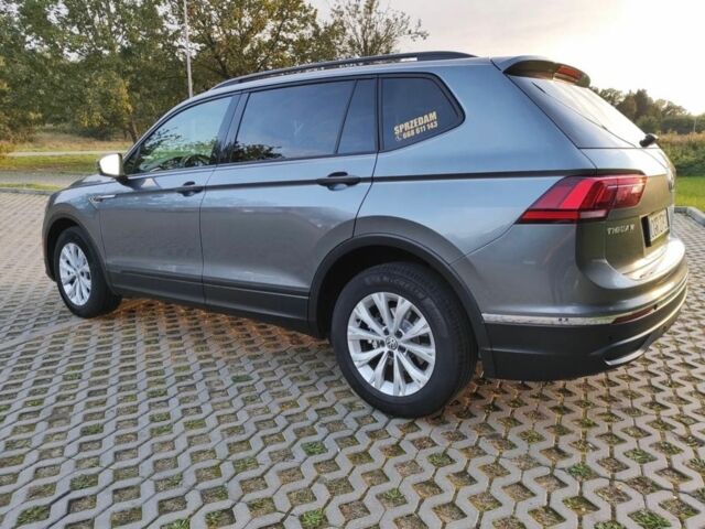 Серый Фольксваген Тигуан, объемом двигателя 2 л и пробегом 140 тыс. км за 9700 $, фото 2 на Automoto.ua