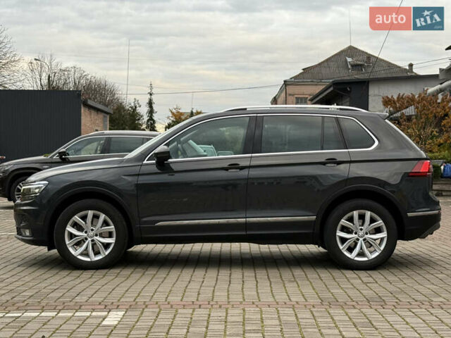 Серый Фольксваген Тигуан, объемом двигателя 2 л и пробегом 143 тыс. км за 29500 $, фото 5 на Automoto.ua