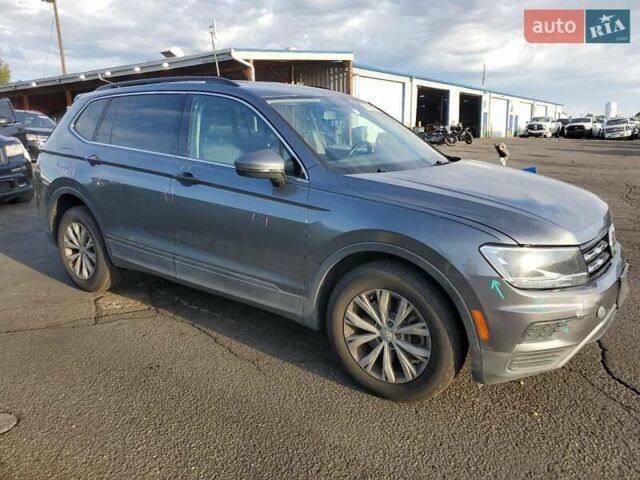 Сірий Фольксваген Тігуан, об'ємом двигуна 2 л та пробігом 154 тис. км за 4800 $, фото 3 на Automoto.ua