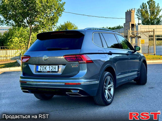 Серый Фольксваген Тигуан, объемом двигателя 2 л и пробегом 237 тыс. км за 28950 $, фото 3 на Automoto.ua