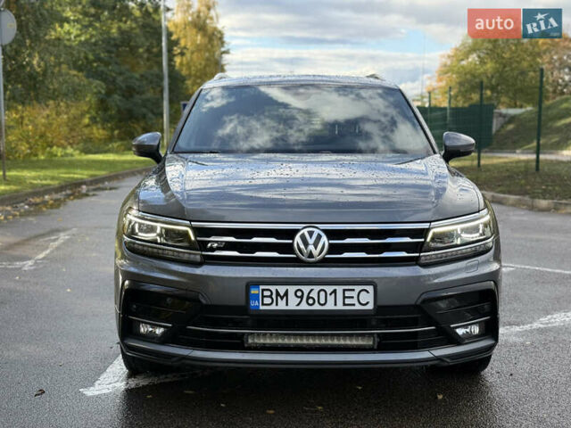Серый Фольксваген Тигуан, объемом двигателя 2 л и пробегом 295 тыс. км за 25900 $, фото 1 на Automoto.ua