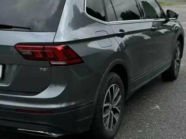 Серый Фольксваген Тигуан, объемом двигателя 2 л и пробегом 130 тыс. км за 14500 $, фото 2 на Automoto.ua