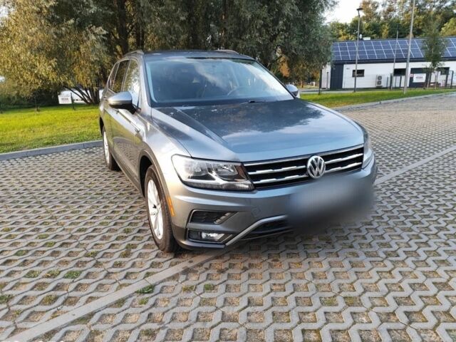 Серый Фольксваген Тигуан, объемом двигателя 2 л и пробегом 140 тыс. км за 9700 $, фото 3 на Automoto.ua