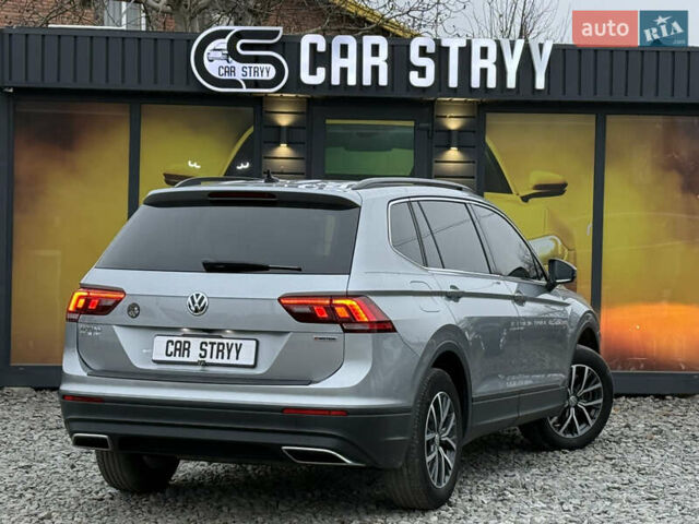 Сірий Фольксваген Тігуан, об'ємом двигуна 2 л та пробігом 62 тис. км за 21500 $, фото 3 на Automoto.ua