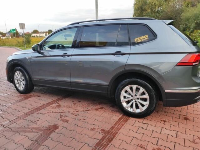 Серый Фольксваген Тигуан, объемом двигателя 2 л и пробегом 140 тыс. км за 9700 $, фото 4 на Automoto.ua
