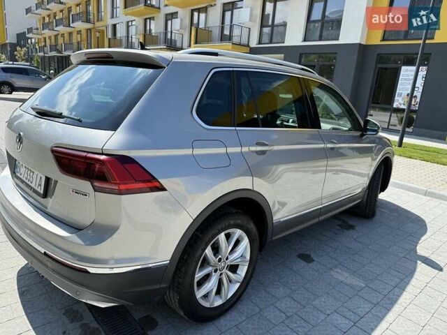 Серый Фольксваген Тигуан, объемом двигателя 1.98 л и пробегом 83 тыс. км за 25800 $, фото 2 на Automoto.ua