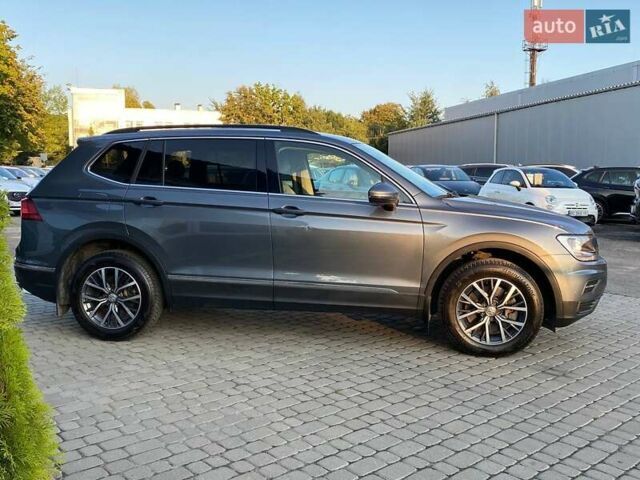 Сірий Фольксваген Тігуан, об'ємом двигуна 1.98 л та пробігом 154 тис. км за 18500 $, фото 4 на Automoto.ua