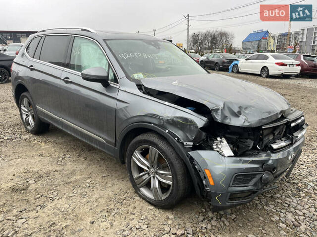 Сірий Фольксваген Тігуан, об'ємом двигуна 2 л та пробігом 176 тис. км за 13500 $, фото 5 на Automoto.ua