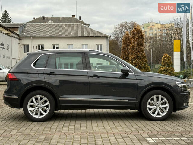 Серый Фольксваген Тигуан, объемом двигателя 2 л и пробегом 143 тыс. км за 29500 $, фото 4 на Automoto.ua