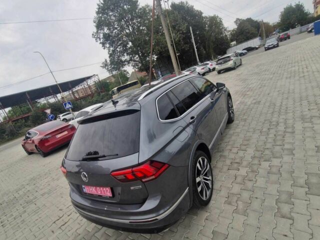 Серый Фольксваген Тигуан, объемом двигателя 2 л и пробегом 214 тыс. км за 21800 $, фото 6 на Automoto.ua