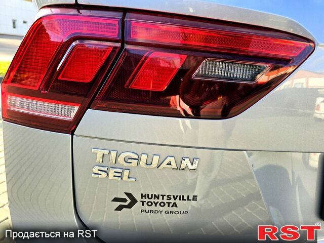 Сірий Фольксваген Тігуан, об'ємом двигуна 2 л та пробігом 147 тис. км за 21950 $, фото 2 на Automoto.ua