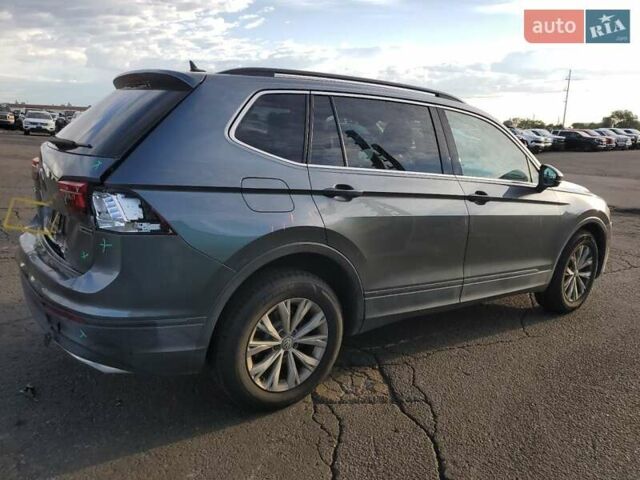 Сірий Фольксваген Тігуан, об'ємом двигуна 2 л та пробігом 154 тис. км за 4800 $, фото 2 на Automoto.ua