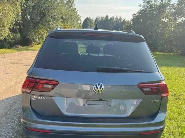 Сірий Фольксваген Тігуан, об'ємом двигуна 2 л та пробігом 103 тис. км за 13000 $, фото 3 на Automoto.ua