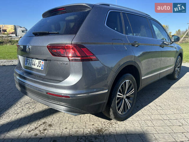 Серый Фольксваген Тигуан, объемом двигателя 2 л и пробегом 212 тыс. км за 26500 $, фото 3 на Automoto.ua
