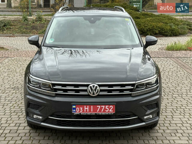 Серый Фольксваген Тигуан, объемом двигателя 2 л и пробегом 143 тыс. км за 29500 $, фото 2 на Automoto.ua