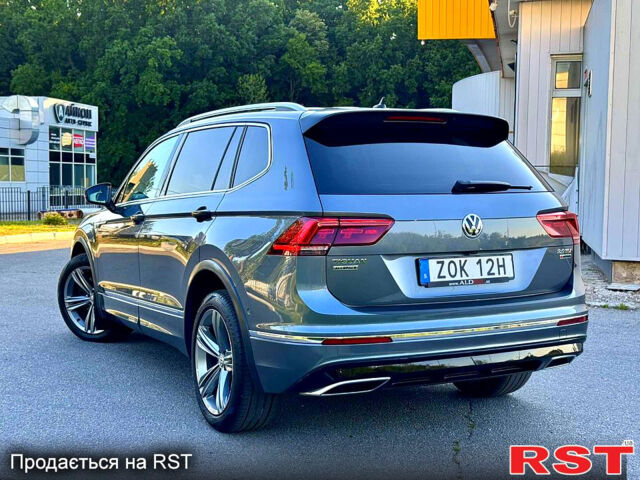 Серый Фольксваген Тигуан, объемом двигателя 2 л и пробегом 237 тыс. км за 28950 $, фото 2 на Automoto.ua