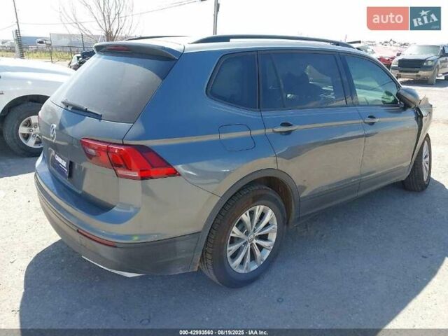 Сірий Фольксваген Тігуан, об'ємом двигуна 2 л та пробігом 74 тис. км за 11390 $, фото 4 на Automoto.ua