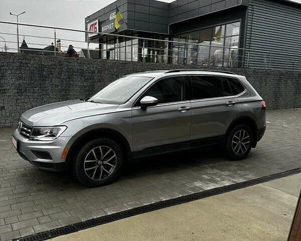 Сірий Фольксваген Тігуан, об'ємом двигуна 2 л та пробігом 195 тис. км за 16200 $, фото 4 на Automoto.ua