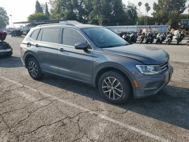 Серый Фольксваген Тигуан, объемом двигателя 2 л и пробегом 49 тыс. км за 4500 $, фото 3 на Automoto.ua