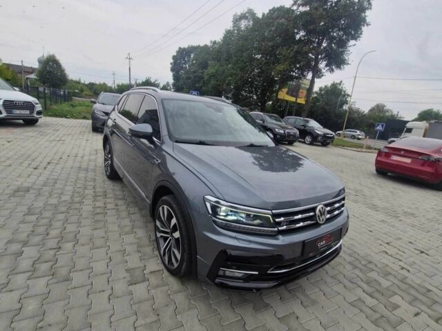 Серый Фольксваген Тигуан, объемом двигателя 2 л и пробегом 214 тыс. км за 21800 $, фото 22 на Automoto.ua