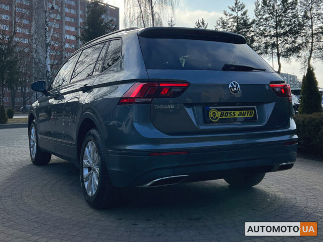 Сірий Фольксваген Тігуан, об'ємом двигуна 2 л та пробігом 136 тис. км за 19300 $, фото 4 на Automoto.ua