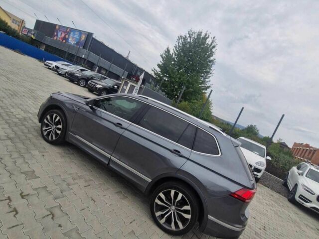 Серый Фольксваген Тигуан, объемом двигателя 2 л и пробегом 214 тыс. км за 21800 $, фото 3 на Automoto.ua