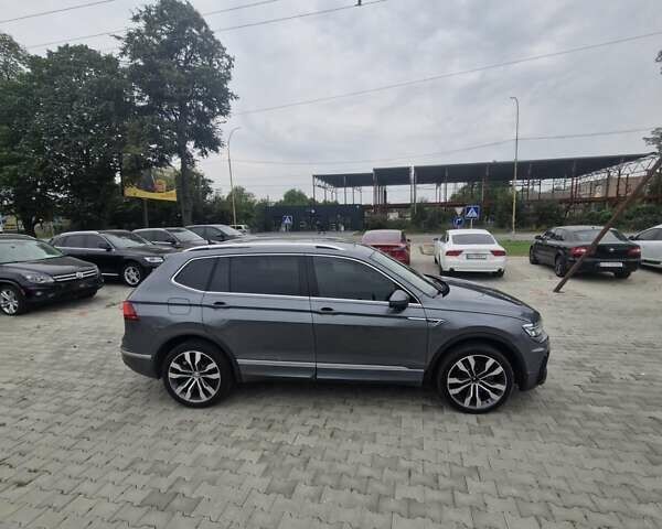 Серый Фольксваген Тигуан, объемом двигателя 2 л и пробегом 213 тыс. км за 21800 $, фото 19 на Automoto.ua