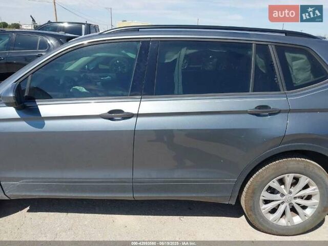 Сірий Фольксваген Тігуан, об'ємом двигуна 2 л та пробігом 74 тис. км за 11390 $, фото 2 на Automoto.ua