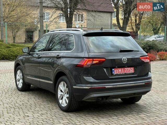 Серый Фольксваген Тигуан, объемом двигателя 2 л и пробегом 143 тыс. км за 29500 $, фото 7 на Automoto.ua